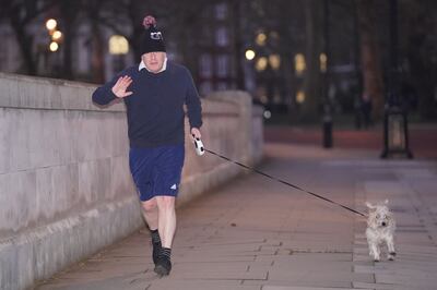 Prime Minister Boris Johnson jogging in central London on Monday morning. PA