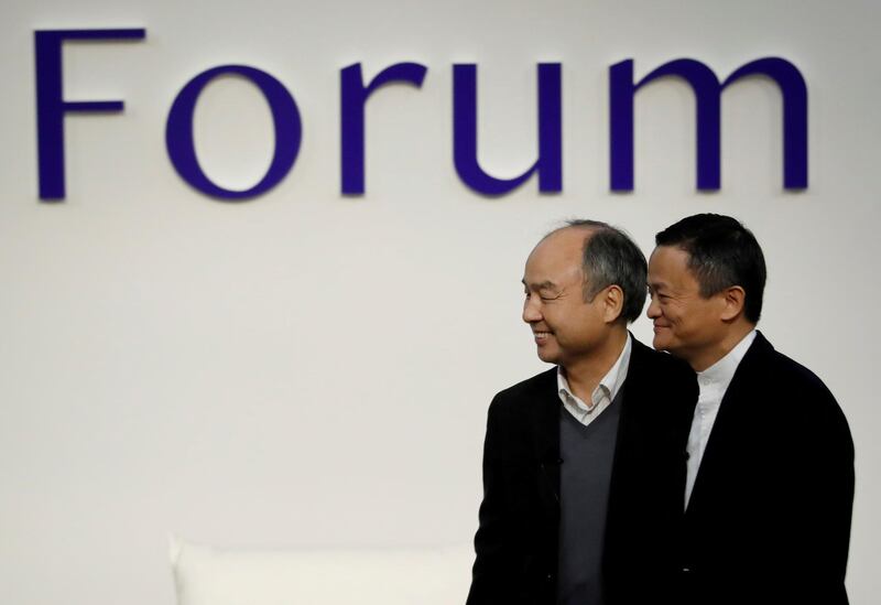 FILE PHOTO: SoftBank Group founder and CEO Masayoshi Son and Alibaba founder and former Chairman Jack Ma attend the Tokyo Forum 2019 in Tokyo, Japan, December 6, 2019. REUTERS/Kim Kyung-Hoon/File Photo