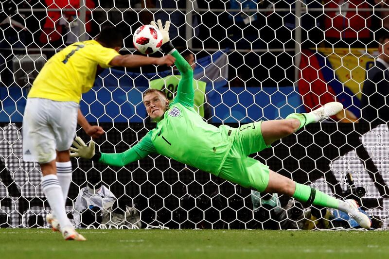 England's Jordan Pickford saves Colombia's Carlos Bacca's penalty, giving England the chance to win it with their next penalty. Alberto Estevez / EPA
