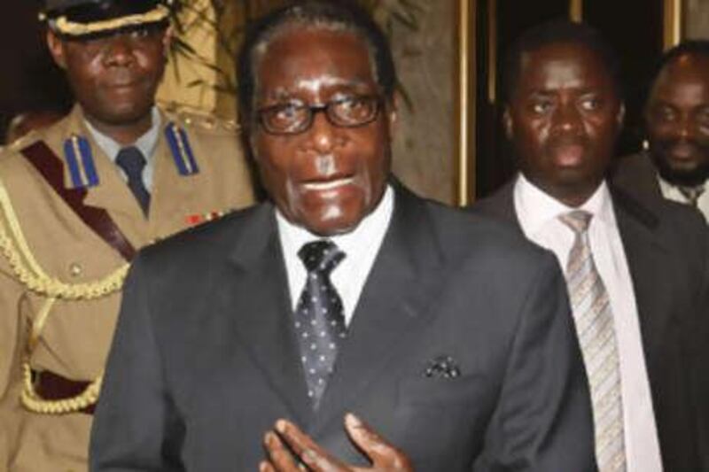 Zimbabwe's president, Robert Mugabe, arrives for talks at the Rainbow Towers hotel in Harare.