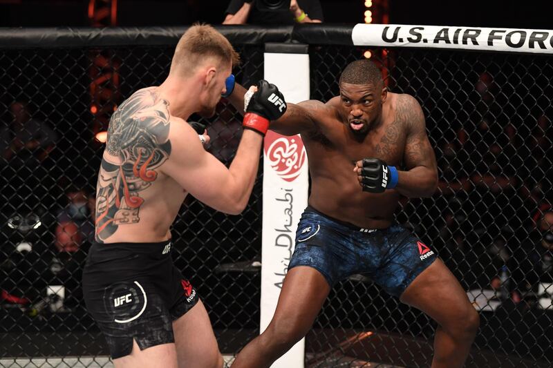 Walt Harris punches Alexander Volkov. Getty