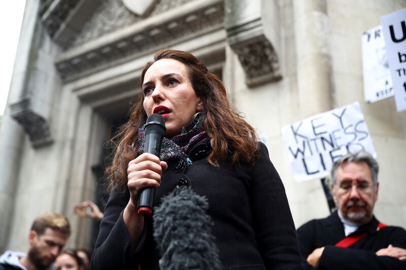 Stella Morris, partner of Julian Assange, speaks to the media. Reuters