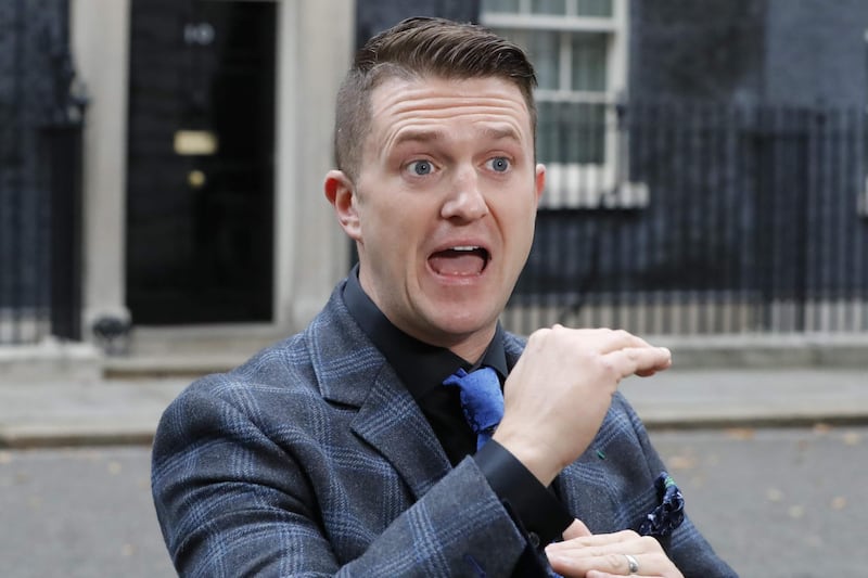 Founder and former leader of the anti-Islam English Defence League, Stephen Yaxley-Lennon, AKA Tommy Robinson, talks to the media after delivering a petition to 10 Downing Street in central London on November 6, 2018. The head of the UK Independence Party has appointed leading far-right activist Stephen Yaxley-Lennon, AKA Tommy Robinson, as a personal adviser, prompting UKIP's former leader Nigel Farage to call for his ouster amid accusations of Islamophobia. UKIP chief Gerard Batten told the BBC on November 23, 2018 that Yaxley-Lennon, a hugely divisive figure who founded the anti-Islam English Defence League, had been appointed as his adviser on "rape gangs and prison reform". / AFP / TOLGA AKMEN
