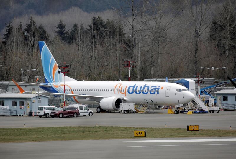 FILE PHOTO: A Boeing 737 MAX aircraft bearing the logo of flydubai is parked at a Boeing production facility in Renton, Washington, U.S. March 11, 2019. REUTERS/David Ryder/File Photo
