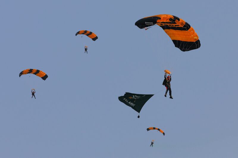 Members of the Pakistan armed forces during a parachute demonstration. Reuters