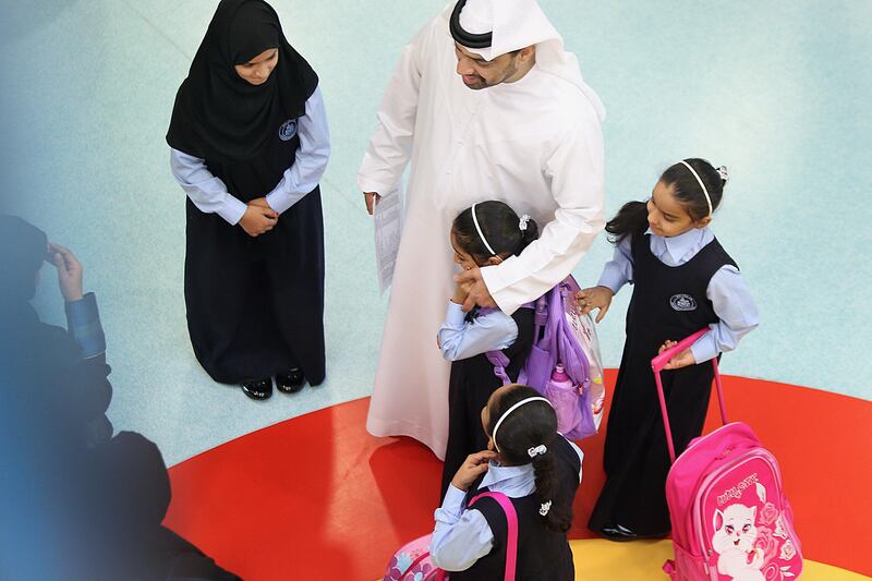 ABU DHABI, UNITED ARAB EMIRATES - - -  September 8, 2013 --- Students returned back to school at Mubarak Bin Mohamed School on Sunday.   ( DELORES JOHNSON / The National ) ***** Reporter is Kyle****** *** Local Caption ***  DJ-0809-NA-BackToSchool-011.jpg