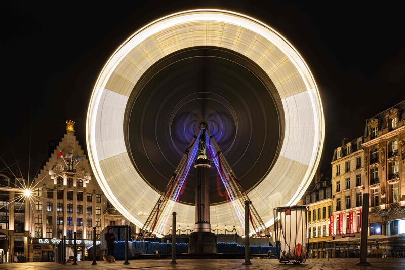 A Ferris wheel on Christmas Eve in Lille. AFP