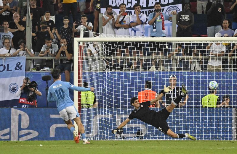 Manchester City's Jack Grealish scoring during the penalty shootout in the Super Cup match against Sevilla. AFP