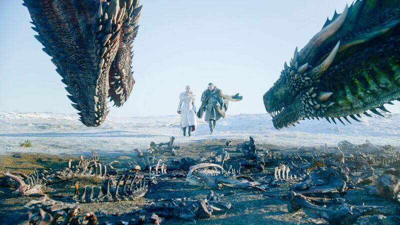 This image released by HBO shows  Emilia Clarke, left, and Kit Harington in a scene from "Game of Thrones," premiering on Sunday, April 14. The first episode of the final season of "Game of Thrones" is a record-breaker for the series and HBO. The pay channel said the 17.4 million viewers who watched Sundayâ€™s episode either on TV or online represent a season-opening high for the fantasy saga. (HBO via AP)