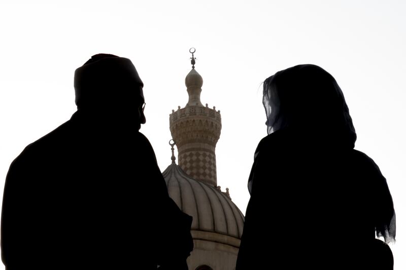 Ms Biden, accompanied by Mohammed Al Mahrasawy, head of Al Azhar University, visits Al Azhar mosque. AP