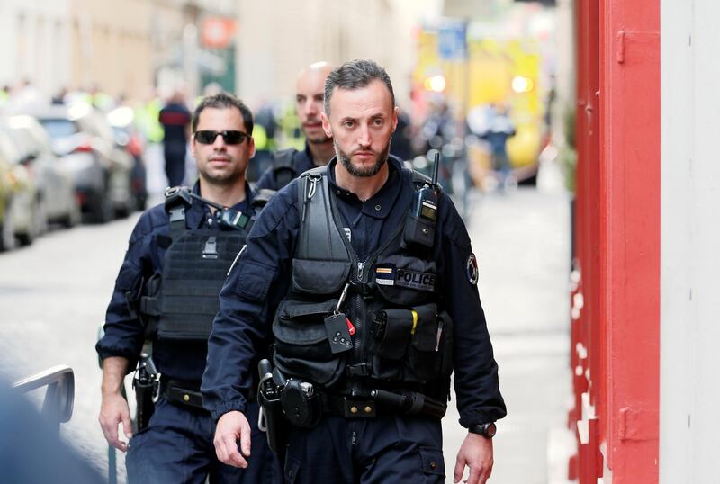 Police officers near the site of a suspected bomb attack in central Lyon. Reuters