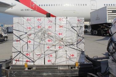 Aid is loaded on to an aircraft at Dubai's International Humanitarian City to be delivered to Sudan, where heavy flooding has displaced thousands of people. Wam