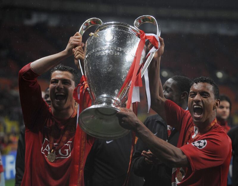 MOSCOW - MAY 21:  Cristiano Ronaldo (L) of Manchester United holds the trophy with Luis Nani of Manchester United during the UEFA Champions League Final match between Manchester United and Chelsea at the Luzhniki Stadium on May 21, 2008 in Moscow, Russia.  (Photo by Shaun Botterill/Getty Images)
