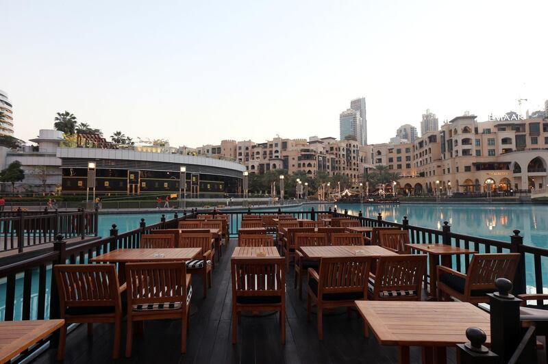 An empty restaurant is pictured outside Dubai Mall. Reuters