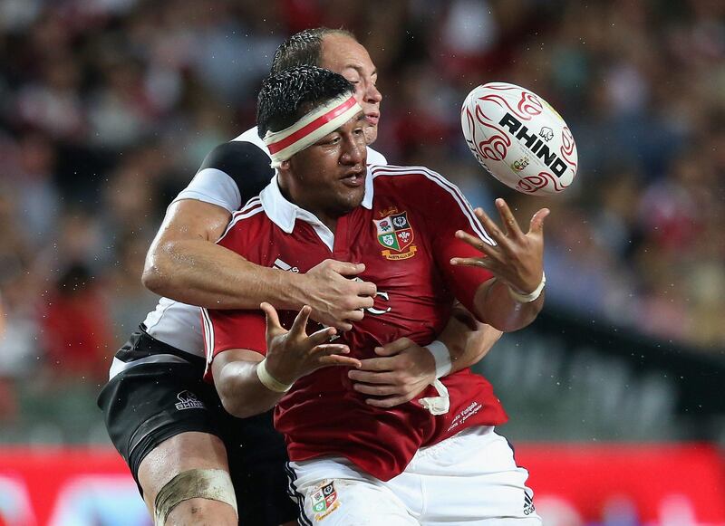 HONG KONG - JUNE 01:  Mako Vunipola of the Lions is tackled by Sergio Parisseduring the match between the British & Irish Lions and the Barbarians at Hong Kong Stadium on June 1, 2013,  Hong Kong.  (Photo by David Rogers/Getty Images) *** Local Caption ***  169761465.jpg