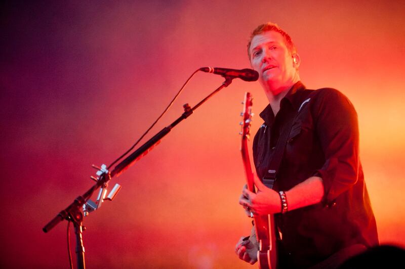 epa06382497 (FILE) - US Singer Josh Homme and his band Queens of The Stone Age perform during a concert at the 22nd Sziget (Island) Festival on the Shipyard Island in northern Budapest, Hungary, 12 August 2014. The festival, one of the biggest cultural events of Europe offering art exhibitions, theatrical and circus performances and above all music concerts during a week runs until 18 August (reissued 11 December 2017). According to news reports, Josh Homme has apologized to a female photographer he had allegedly kicked in the head during a concert in Los Angeles, USA on 09 December 2017.  EPA/BALAZS MOHAI HUNGARY OUT