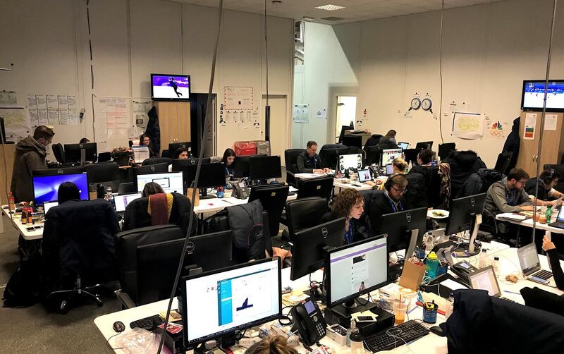 Pyeongchang 2018 Winter Olympics – Pyeongchang, South Korea – February 14, 2018. Employees work on their computers inside a room at NBC's broadcasting centre. NBC Olympics/Handout via REUTERS ATTENTION EDITORS - THIS IMAGE WAS PROVIDED BY A THIRD PARTY NO ARCHIVES NO RESALES