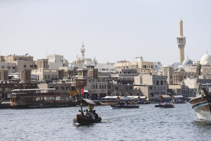 For many people Deira and the creek, with its dhow moorings, abra water taxis, and souks is the very essence of the old city. Sarah Dea / The National