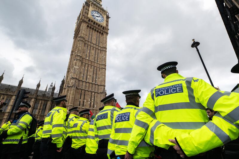 Police cordon pro-Palestinian protesters at Parliament in London, on January 6. Getty Images