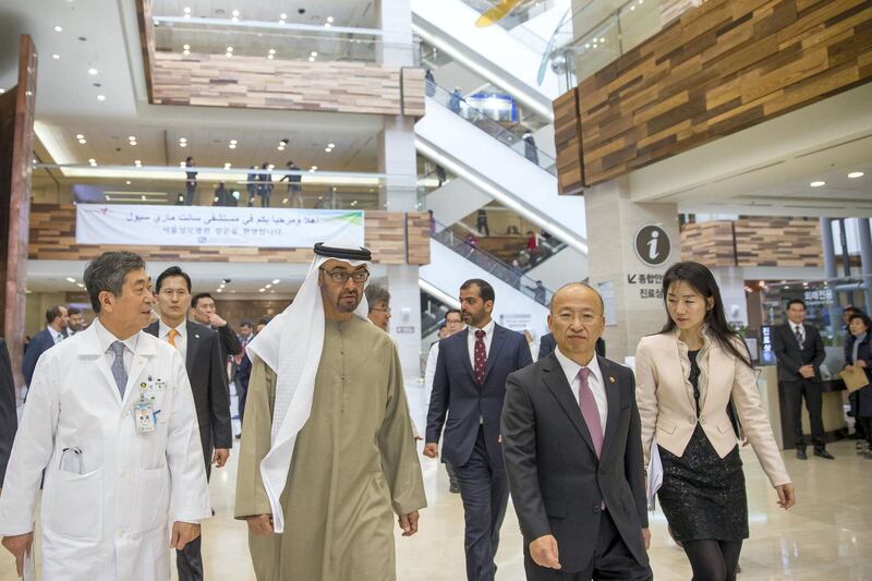 SEOUL, REPUBLIC OF KOREA (SOUTH KOREA) - February 27, 2014: HH General Sheikh Mohamed bin Zayed Al Nahyan Crown Prince of Abu Dhabi Deputy Supreme Commander of the UAE Armed Forces (4th R), and HH Sheikh Hamed bin Zayed Al Nahyan Chairman of Crown Prince Court - Abu Dhabi and Executive Council Member  (back 3rd R), visit Emirati patients receiving treatment at Seoul Saint Mary's Hospital in the Republic of Korea with HE Moon Hyung-Pyo, Minister of Health and Welfare of Korea (2nd R).
( Mohamed Al Hammadi / Crown Prince Court - Abu Dhabi )
---