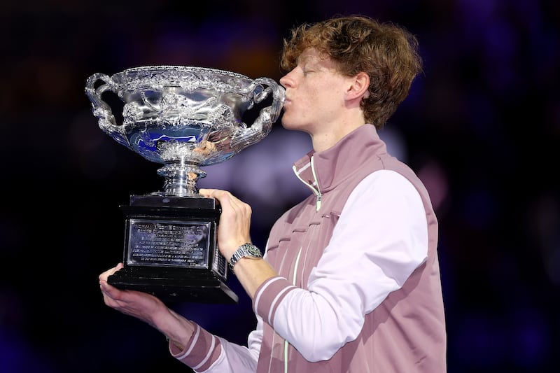 Jannik Sinner with the trophy after winning the Australian Open final. Getty Images