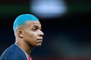 Paris Saint Germain's Kylian Mbappe sporting a new blue hairstyle. EPA