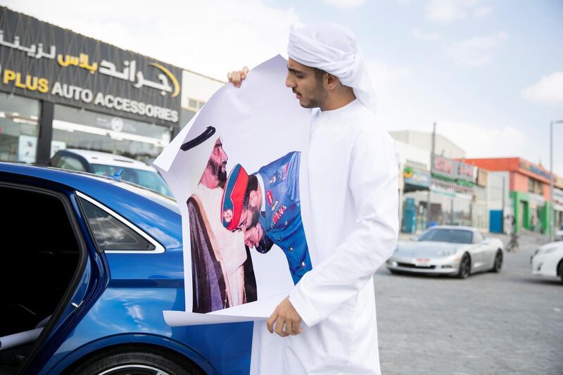 ABU DHABI, UNITED ARAB EMIRATES - NOVEMBER 27, 2018. 

Mohammed Al Dhal'ii is partaking in a car decoration competition in his university today.

He's in Mussafah looking for National Day decorations for his car.

Car accessory shops in Mussafah are keeping busy as motorists rush to dress up their vehicles ahead of the UAE's 47th National Day.

(Photo by Reem Mohammed/The National)

Reporter:  HANEEN DAJANI
Section:  NA