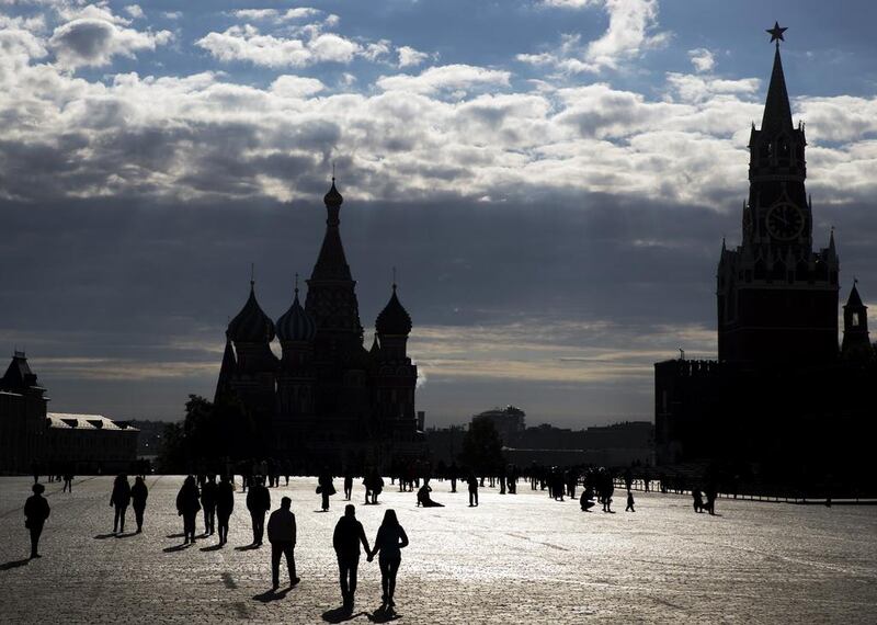 People walk at Red Square in Moscow, Russia. Red Square is considered the main square of the capital and has held outdoor markets, festivals, and parades. Pavel Golovkin / AP Photo