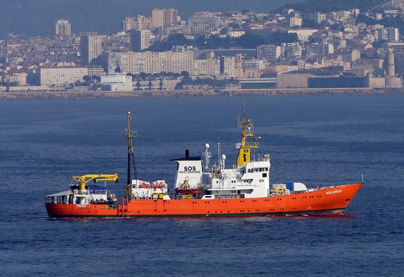 FILE -- In this file photo taken on Aug. 1, 2018, French NGO "SOS Mediterranee" Aquarius ship leaves the Marseille harbour, southern France. Italian prosecutors have ordered the seizure of a migrant rescue ship and accused the aid group Doctors Without Borders of illegally disposing 24 metric tons (26.5 tons) of medical and contaminated waste accumulated during nearly 50 rescues.  (AP Photo/Claude Paris)
