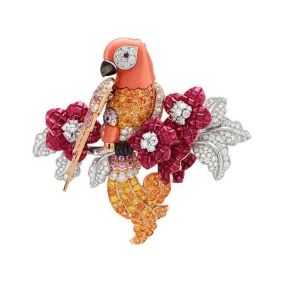 Le Secret brooch by Van Cleef & Arpels, with a parrot and chick