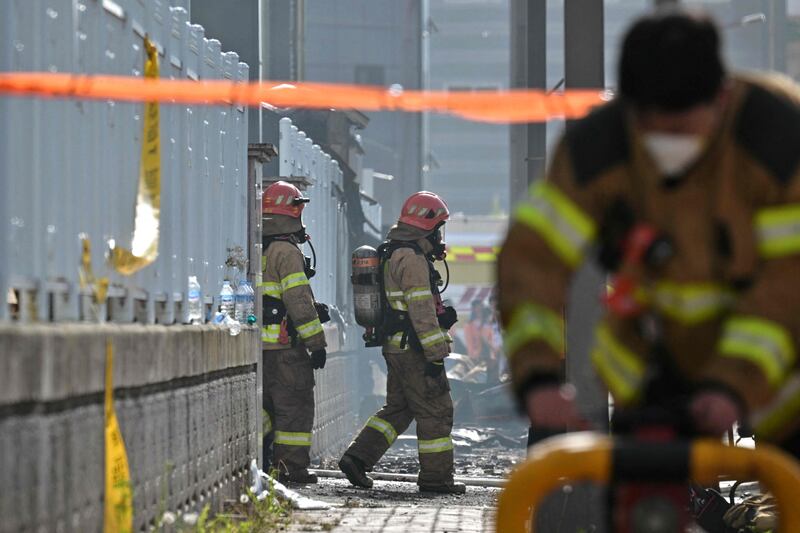 Firefighters at a lithium battery factory, owned by South Korean battery maker Aricell, in Hwaseong after a blaze. AFP