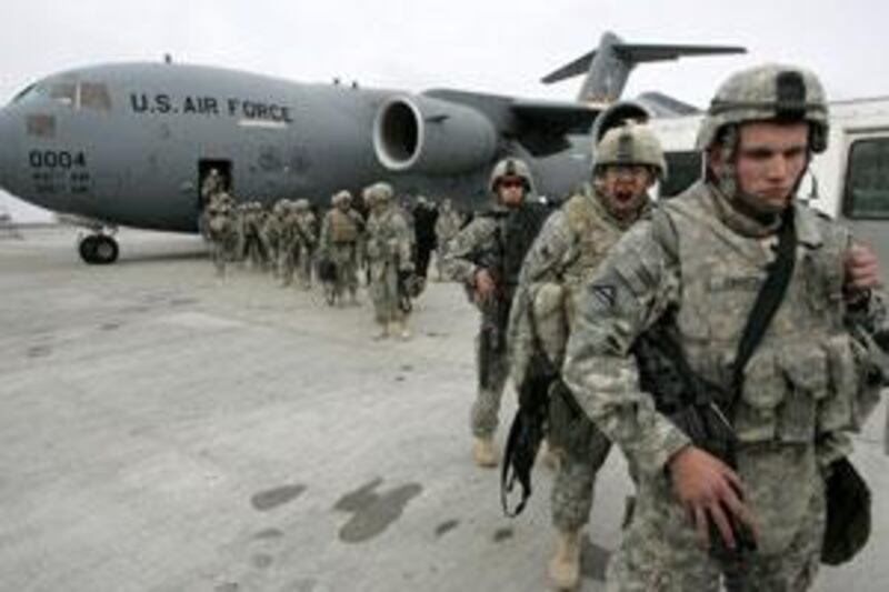 US soldiers return from Afghanistan to a US airbase 30km outside Bishkek, in Manas, on Feb 26 2009.