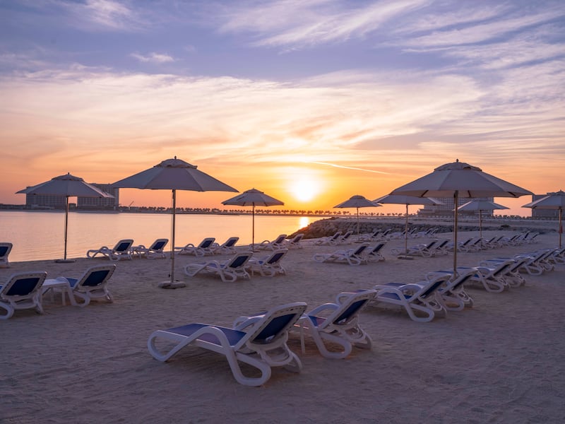 Catch the sunset from the beach at Radisson Resort.