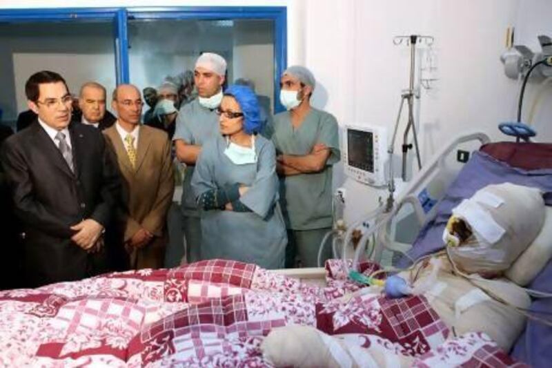Tunisian President Zine El-Abidine Ben Ali visits Mohamed Al Bouazzizi, the protester who set himself alight on 17 December in what triggered riots in Tunisia and thus the Arab Spring.