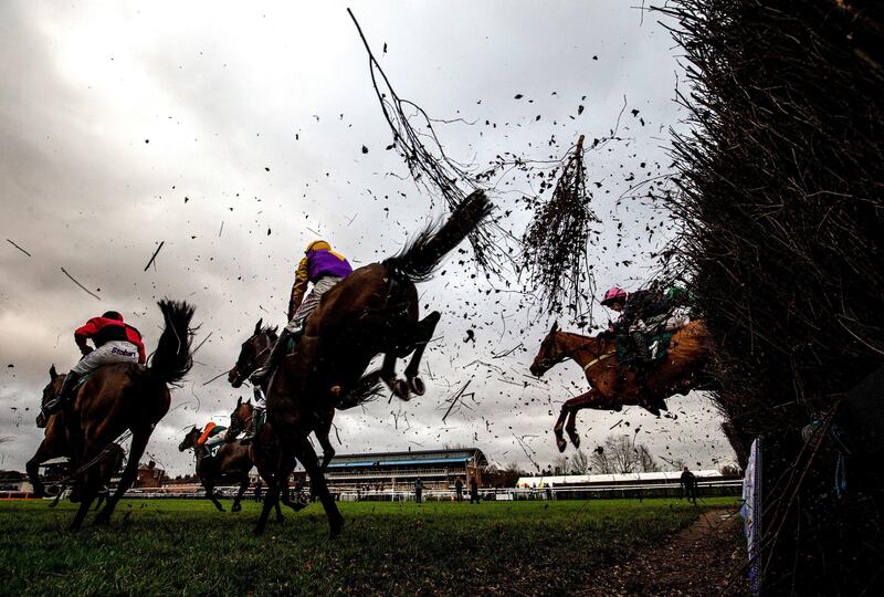 Runners and riders during the McCoy Contractors Civil Engineering Classic Handicap Chase at Warwick Racecourse in England, on  Saturday, January 11. PA