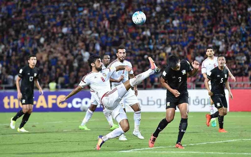 Hamdan Al Kamali of the UA, centre, clears the ball during the 2018 World Cup qualifier against Thailand at the Rajamangala Stadium in Bangkok, Thailand, 13 June 2017. The match ended 1-1. Courtesy UAE FA