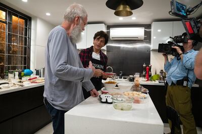 A behind the scenes photo of chat show host David Letterman in the kitchen with Bollywood star Shah Rukh Khan, in 'My Next Guest with David Letterman and Shah Rukh Khan'. Courtesy Netflix 