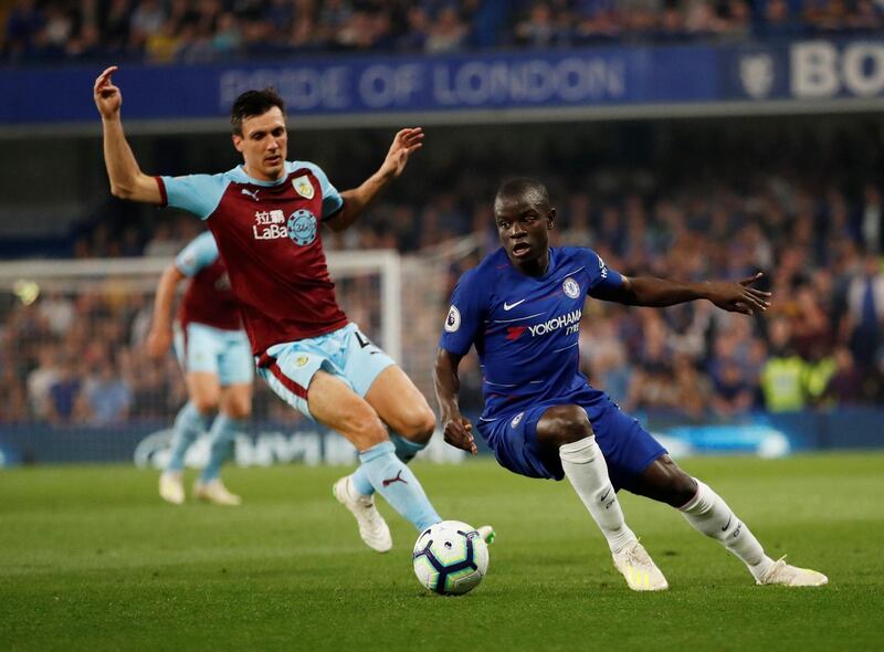 Chelsea's N'Golo Kante in action with Burnley's James Tarkowski. Kante equalised for the Blues. Reuters