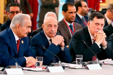 Libya’s Khalifa Haftar, speaker of the eastern-based parliament Aguila Saleh, and head of the Tripoli-based government Fayez Al Sarraj attend an International Congress on Libya at the Elysee Palace in Paris in 2018. AFP