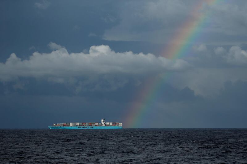 A rainbow is seen over the container ship 'Maersk Genoa' as it sails off the northern coast of Tunisia in the central Mediterranean.  Reuters
