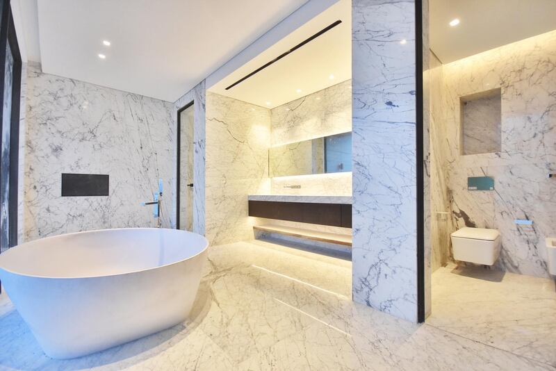 <p>The bathroom is, of course, heavy on the marble front.&nbsp;Courtesy LuxuryProperty.com</p>
