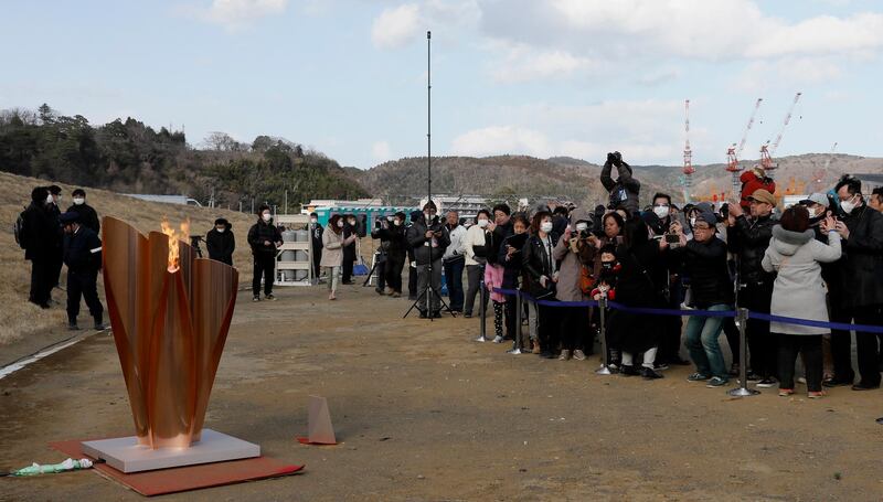 The Olympic flame on a cauldron is displayed at Ishinomaki Minamihama Tsunami Recovery Memorial Park in Ishinomaki, Miyagi Prefecture, on Friday.  EPA