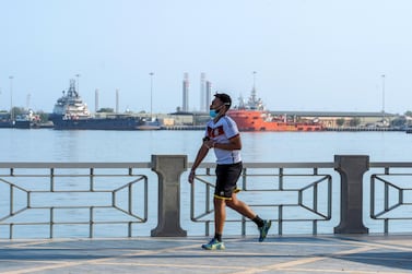 Abu Dhabi, United Arab Emirates, June 14, 2020. Abu Dhabi residents exercise on the reopened side of the Corniche as the UAE gradually returns to normal life as restrictions are being eased. Victor Besa / The National Section: NA Reporter: