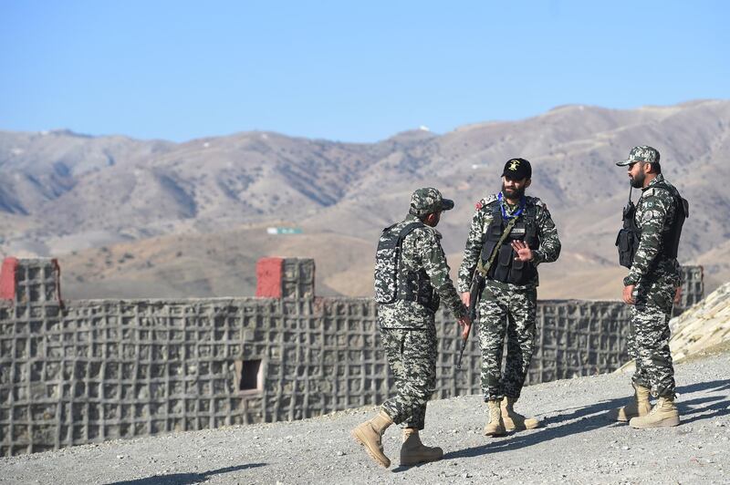 Pakistani army soldier stand guard on a border terminal in Ghulam Khan, a town in North Waziristan, on the border between Pakistan and Afghanistan, on January 27, 2019. - Afghans harboured furtive hopes on January 27 that talks between the US and Taliban leaders could end decades of conflict, despite fears an American withdrawal might unleash even more violence. American negotiators and the Taliban on January 26 said the two sides had made substantial progress in the most recent round of talks in Qatar, promising to meet again to continue discussions that could pave the way for official peace negotiations. (Photo by FAROOQ NAEEM / AFP)