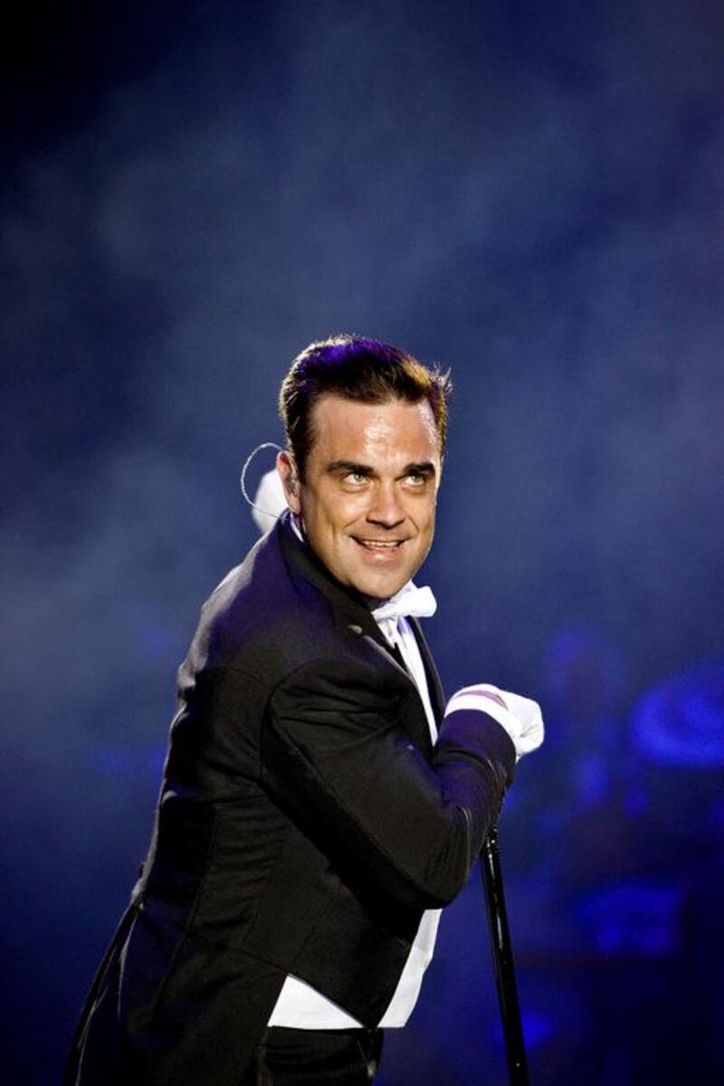 Robbie Williams performs at Du Arena, Yas Island on Saturday, April 25, 2015. Patricia De Melo Moreira / AFP