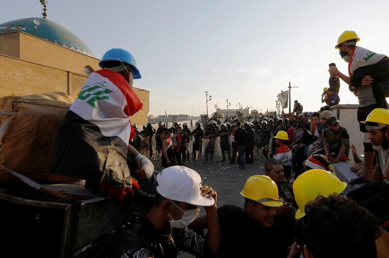 Demonstrators block Al Shuhada bridge during ongoing anti-government protests, in Baghdad, Iraq. Reuters