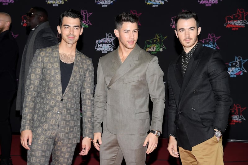 CANNES, FRANCE - NOVEMBER 09: (L-R) Joe Jonas, Nick Jonas and Kevin Jonas attend the 21st NRJ Music Awards at Palais des Festivals on November 09, 2019 in Cannes, France. (Photo by Pascal Le Segretain/Getty Images)