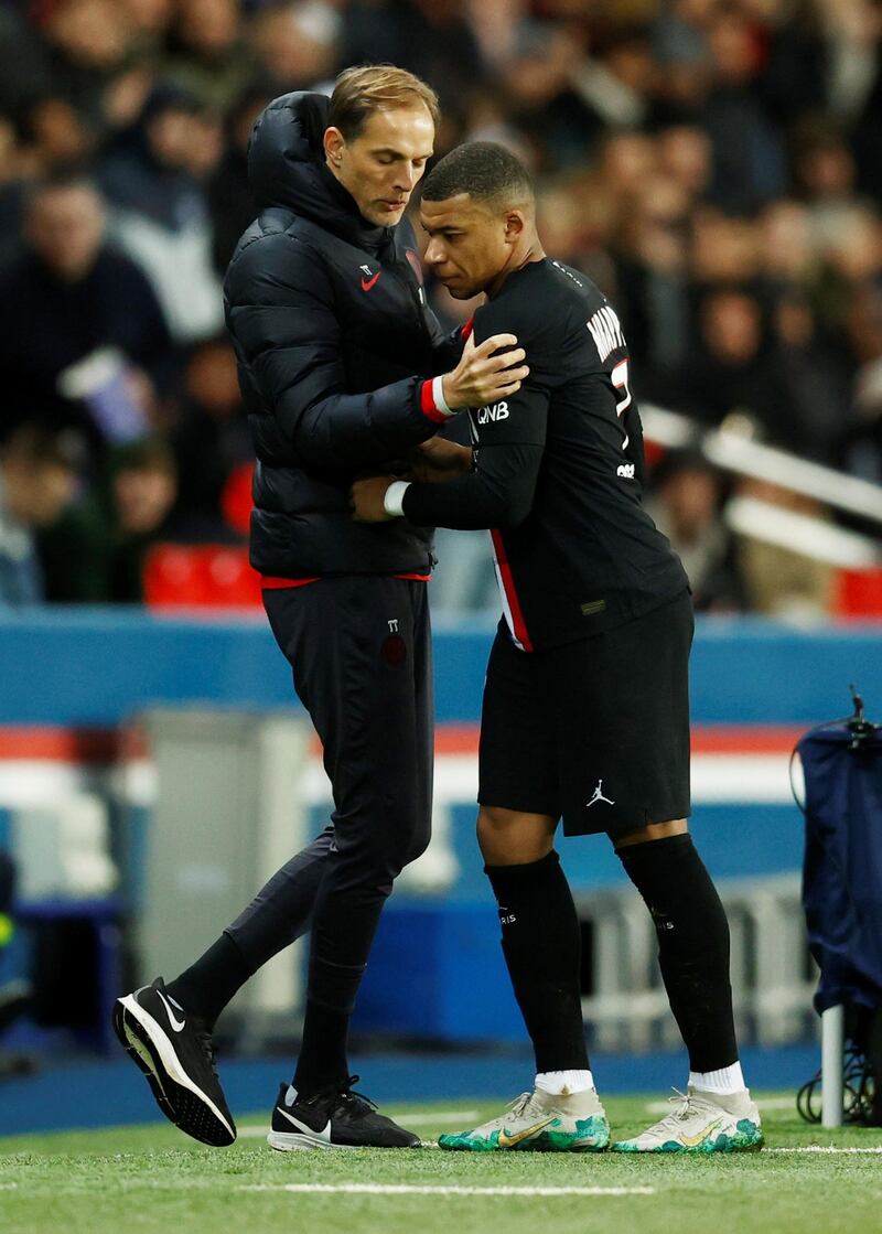 Thomas Tuchel with Kylian Mbappe. Reuters