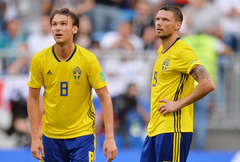 epa06871478 Albin Ekdal (L) and Marcus Berg of Sweden react after going 2-0 down during the FIFA World Cup 2018 quarter final soccer match between Sweden and England in Samara, Russia, 07 July 2018.

(RESTRICTIONS APPLY: Editorial Use Only, not used in association with any commercial entity - Images must not be used in any form of alert service or push service of any kind including via mobile alert services, downloads to mobile devices or MMS messaging - Images must appear as still images and must not emulate match action video footage - No alteration is made to, and no text or image is superimposed over, any published image which: (a) intentionally obscures or removes a sponsor identification image; or (b) adds or overlays the commercial identification of any third party which is not officially associated with the FIFA World Cup)  EPA/PETER POWELL   EDITORIAL USE ONLY