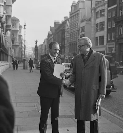 British Conservative Party politician and journalist Winston Churchill (1940-2010) stands on left with American businessman and intelligence expert Miles Copeland Jr (1916-1991) outside the Royal Courts of Justice on the Strand in London, November 25, 1970. Miles would play host to Philby during his time in Beirut. Getty Images